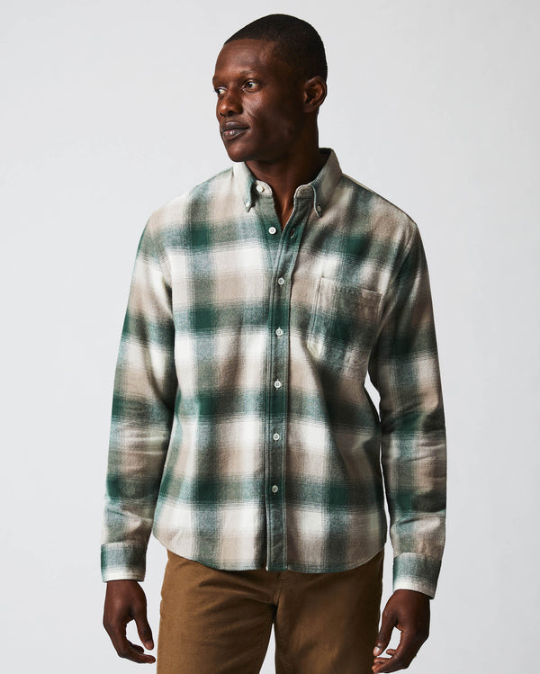 Male model wears the flannel bold plaid tuscumbia shirt button down in natural/green