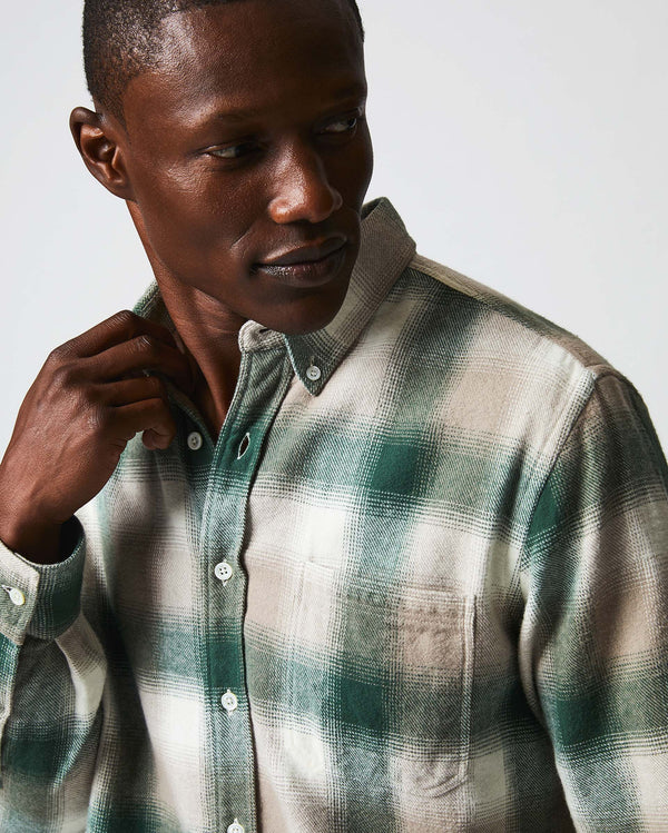 Male model wears the flannel bold plaid tuscumbia shirt button down in natural/green