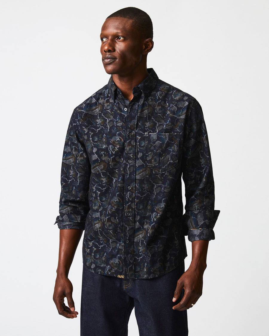 Male model wears the Lowtide MSL 1 Pocket Shirt in Carbon Blue