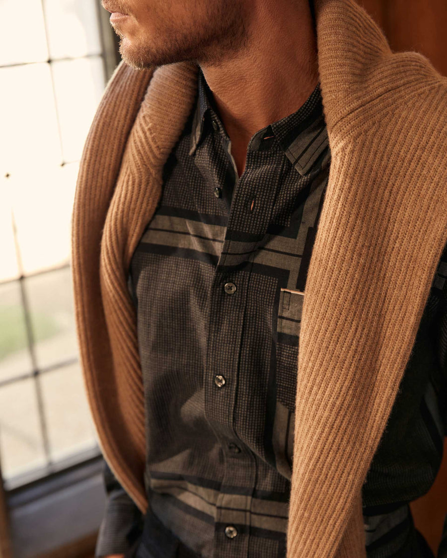Male model wears the textured plaid MSL 1-Pocket shirt in black/dark brown