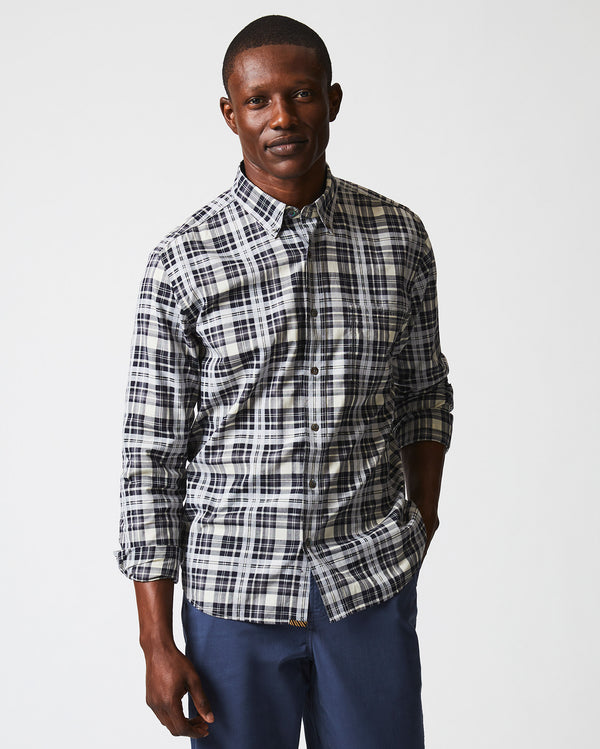 Male model wears the melange textural plaid tuscumbia shirt bd in grey/black