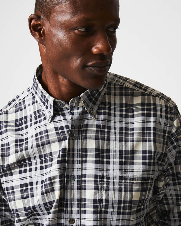 Male model wears the melange textural plaid tuscumbia shirt bd in grey/black