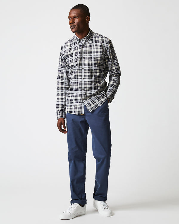 Male model wears the melange textural plaid tuscumbia shirt bd in grey/black