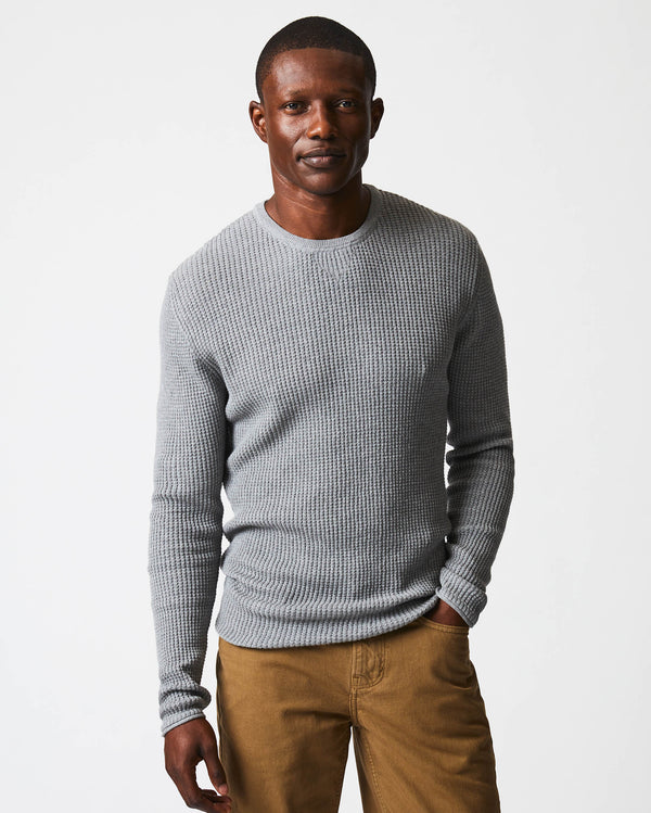 Male model wears the mini waffle crew in grey