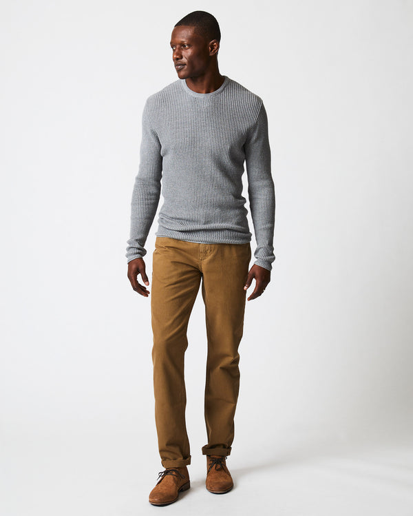 Male model wears the mini waffle crew in grey