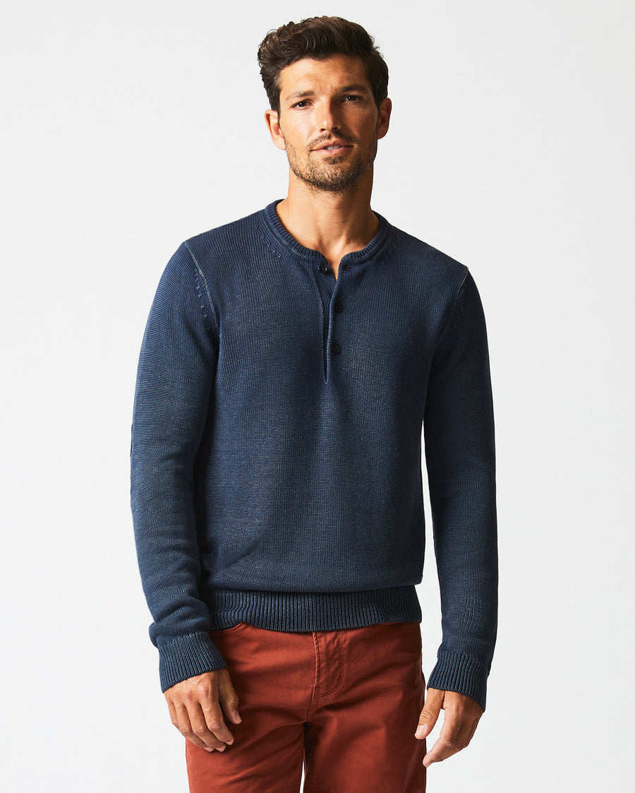 Male model wears the Garment Dyed Henley Sweater in Carbon Blue