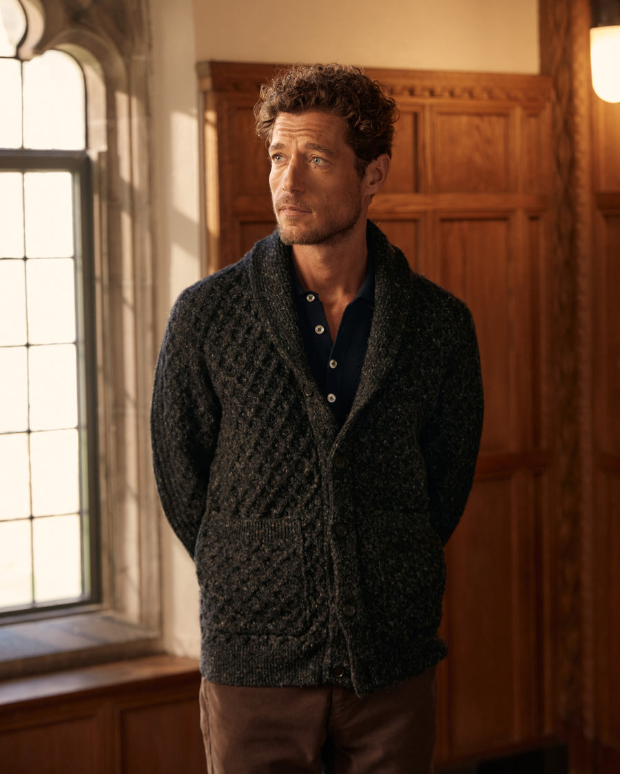 Male model wears the Honeycomb Cardigan in Charcoal