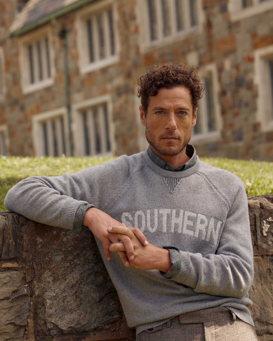 Male model wears the Southern Sweater in Grey