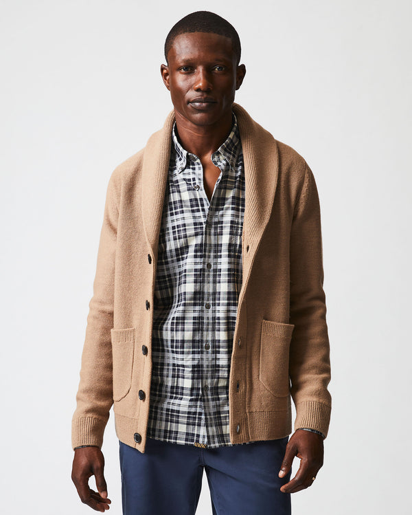 Male model wears the Collegiate Cardigan in Camel/Heather
