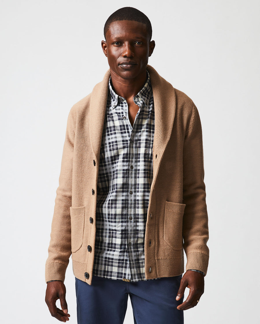 Male model wears the Collegiate Cardigan in Camel/Heather