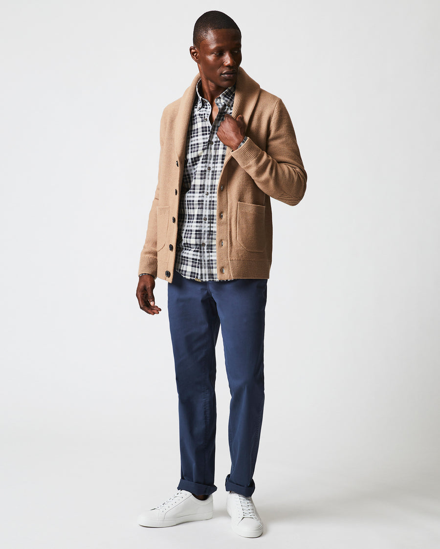 Male model wears the Collegiate Cardigan in Camel/Heather