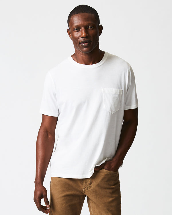 Male model wears the Washed Tee in White