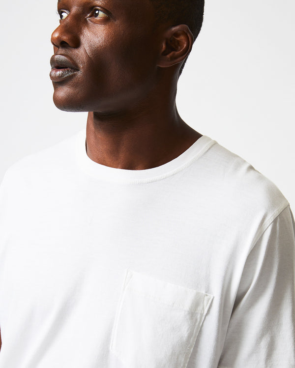 Male model wears the Washed Tee in White