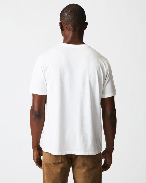 Male model wears the Washed Tee in White