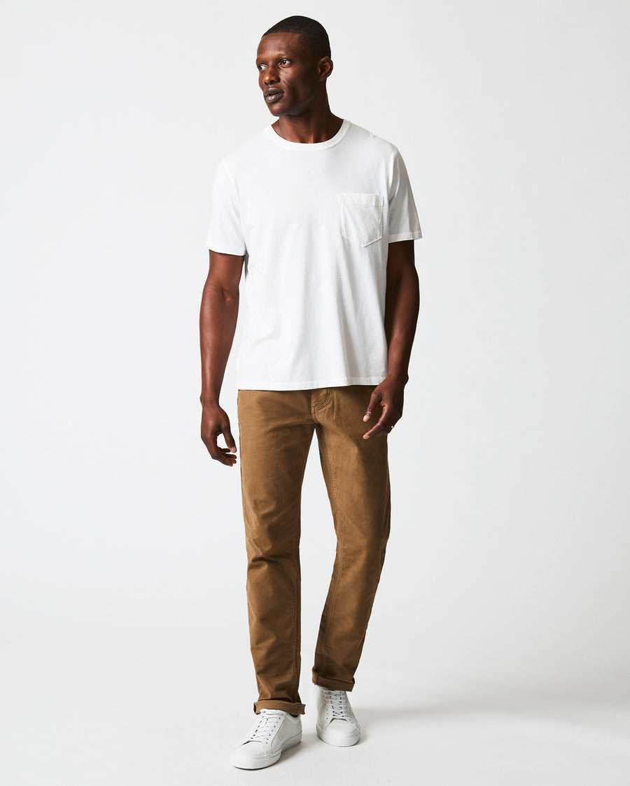 Male model wears the Washed Tee in White