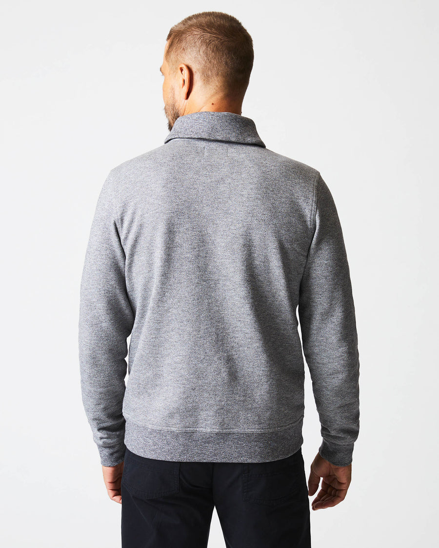 Male model wears the Mouline Shawl Pullover in Medium Grey