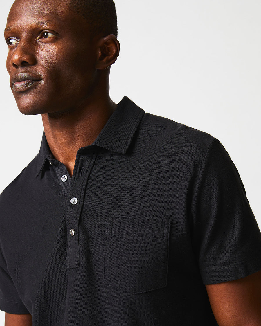 Male model wears the Pique Pensacola Polo in Black