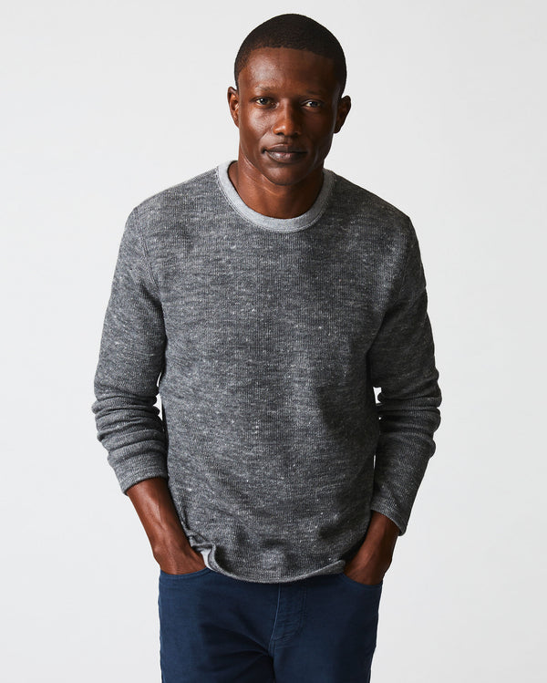 Male model wears the LS Rib Tee in Heather Grey