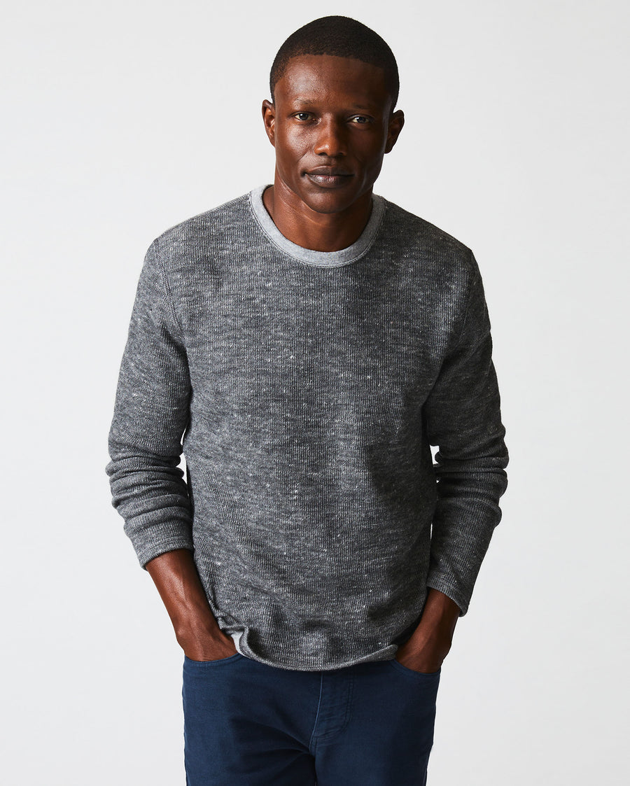 Male model wears the LS Rib Tee in Heather Grey