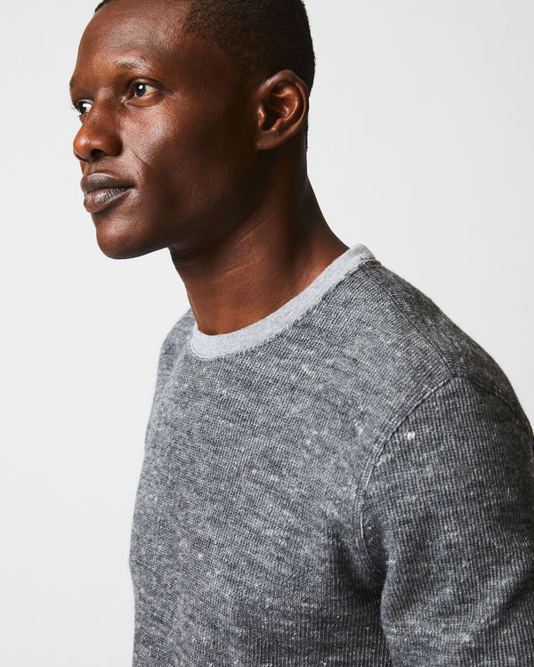 Male model wears the LS Rib Tee in Heather Grey