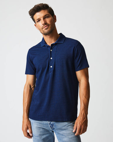Male model wears the Indigo Polo in Dark Indigo