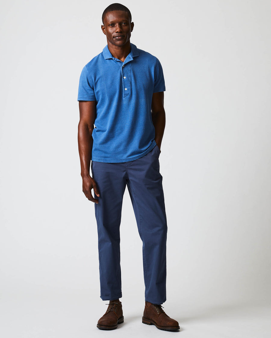 Male model wears the Indigo Polo in Denim 