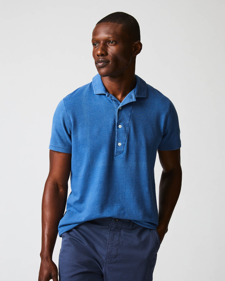 Male model wears the Indigo Polo in Denim 