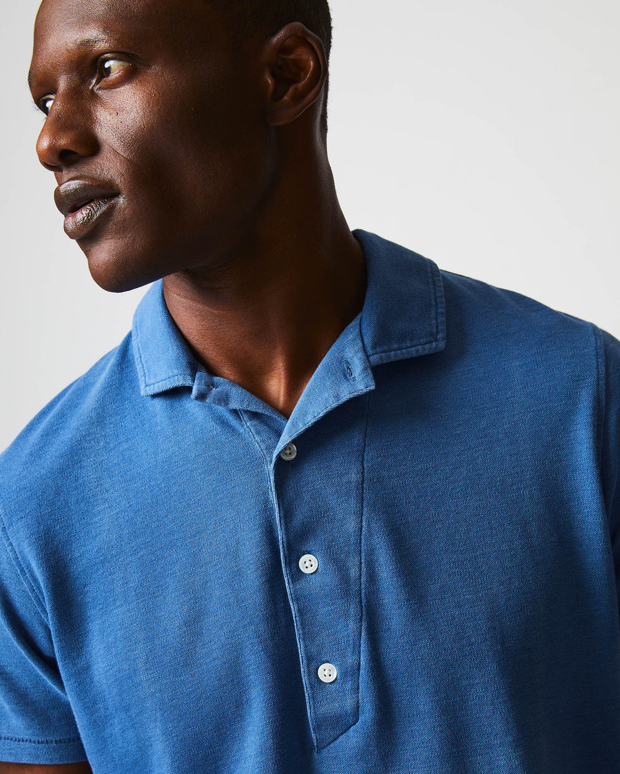 Male model wears the Indigo Polo in Denim 