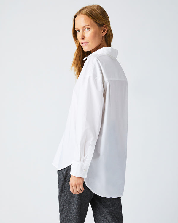 Female model wears the The Big Shirt in White