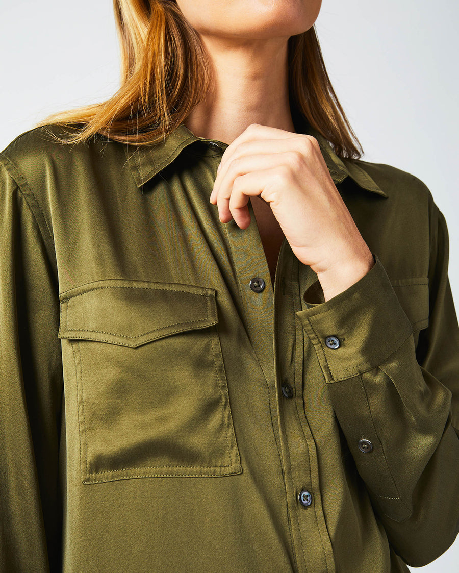Female model wears the utility shirt in burnt olive