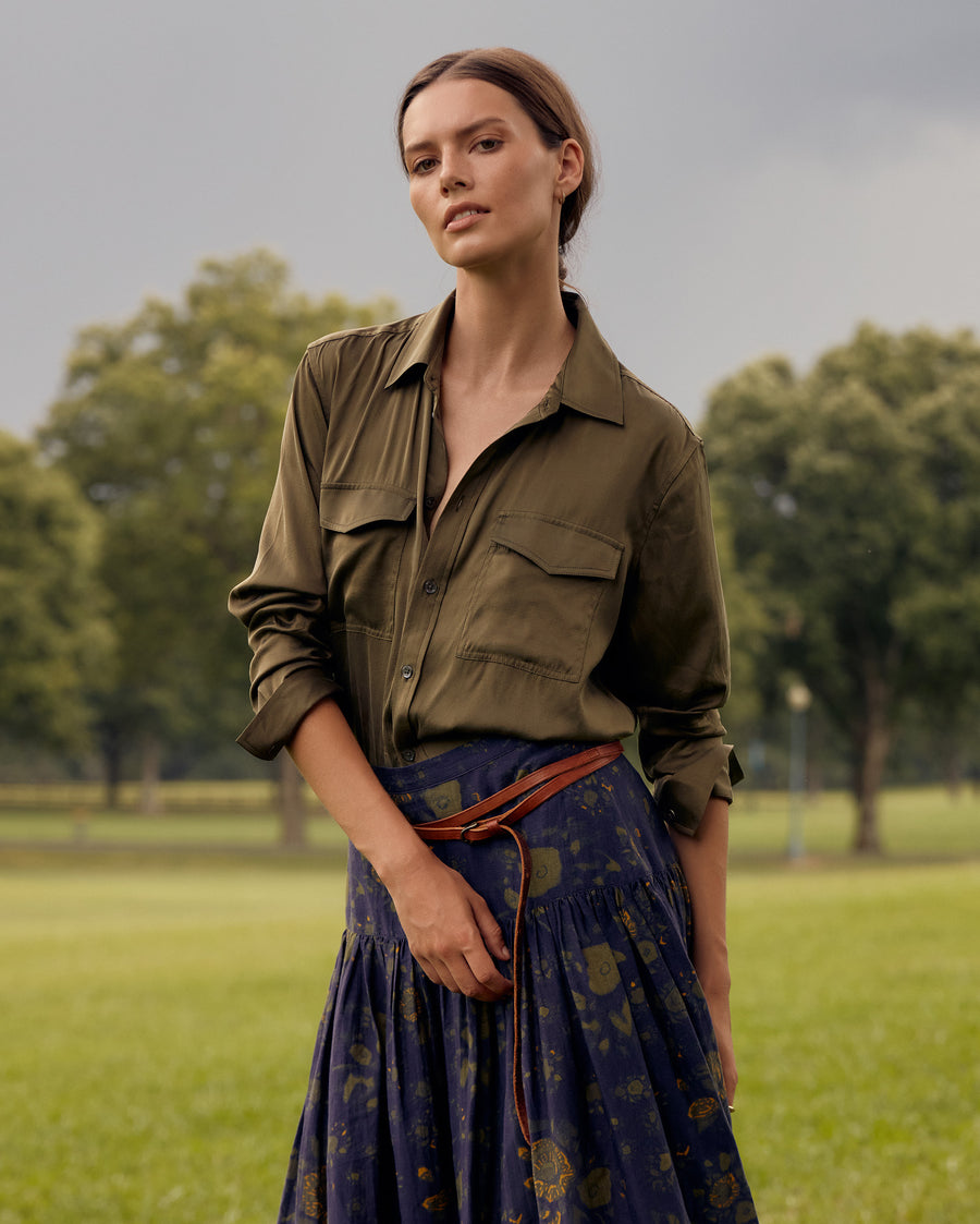 Female model wears the utility shirt in burnt olive