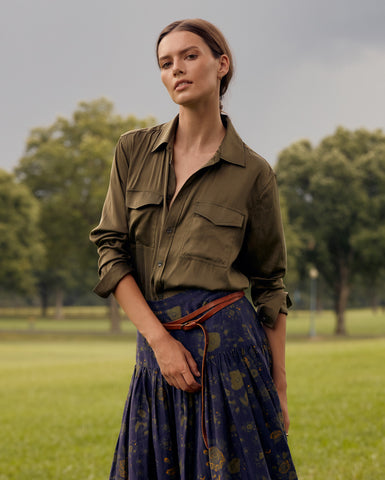 Female model wears the utility shirt in burnt olive