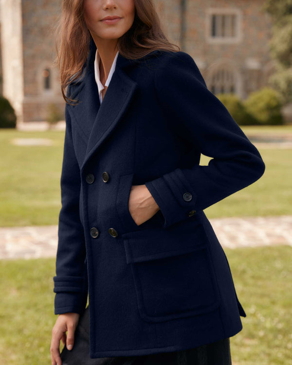 Female model wears the Peacoat in Navy/Topaz