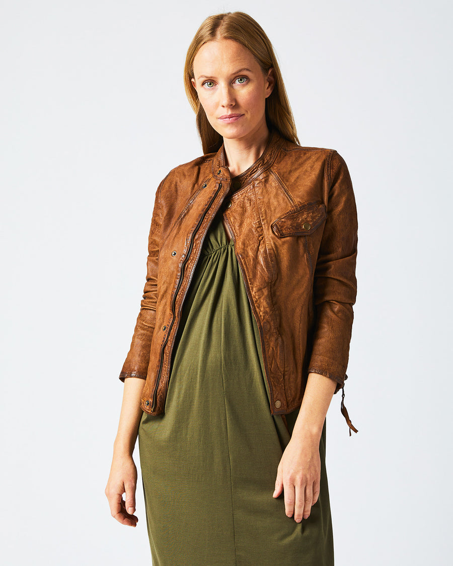 Female model wears the Biker Jacket in Brown