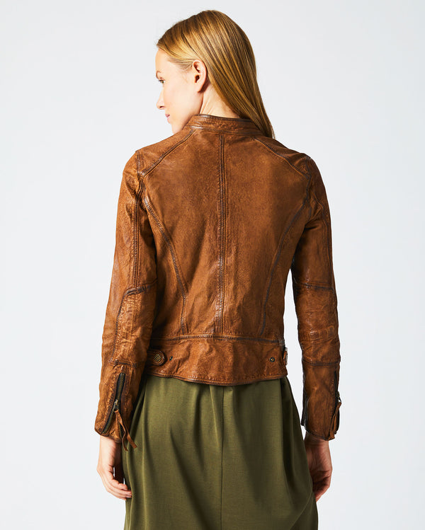 Female model wears the Biker Jacket in Brown
