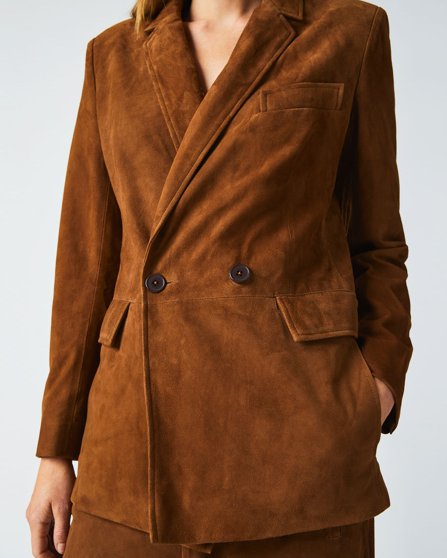 Female model wears the Suede Blazer in Cognac