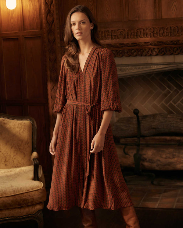 Female model wears the Tea Dress in Wine/Chocolate