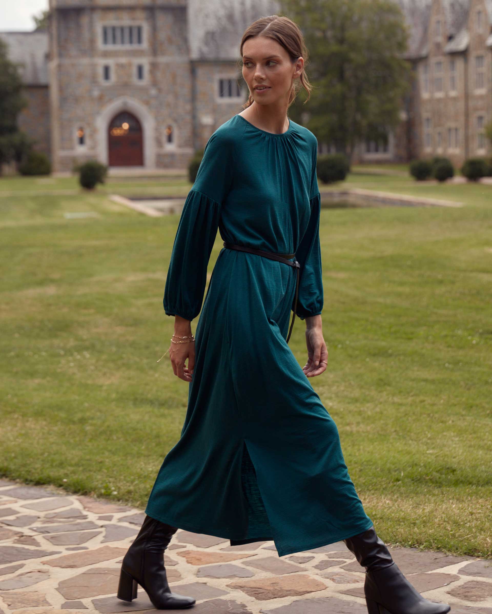 Female model wears the Keyhole Midi Dress in Teal