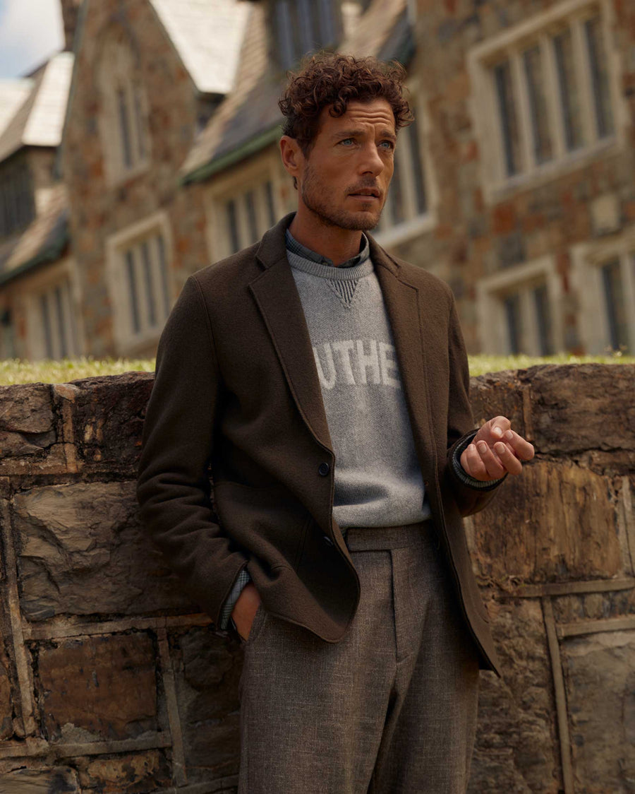 Male model wears the Boiled Wool Sport Coat in Olive