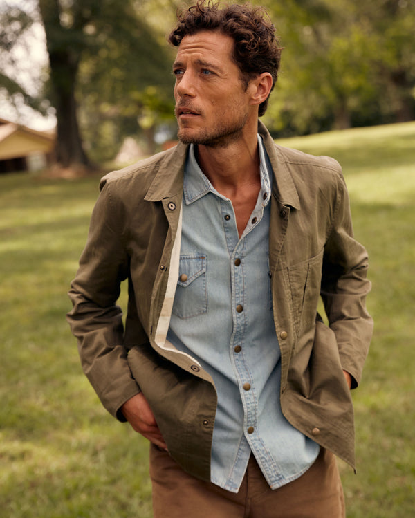 Male model wears the Leroy Shirt Jacket in Moss Green