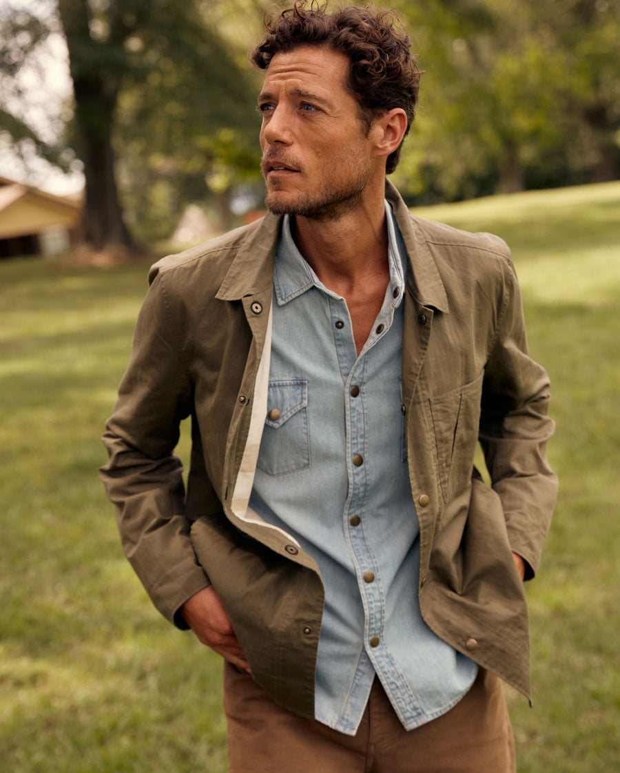 Male model wears the Leroy Shirt Jacket in Moss Green