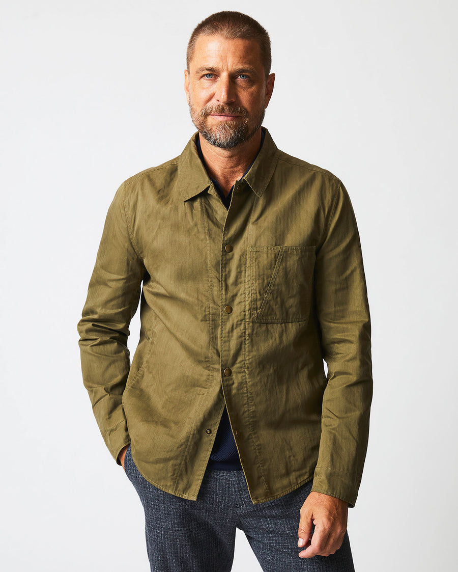 Male model wears the Leroy Shirt Jacket in Moss Green