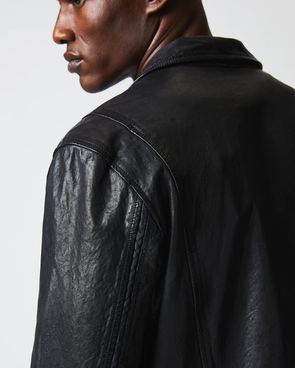 Male model wears the Blake Jacket in Black