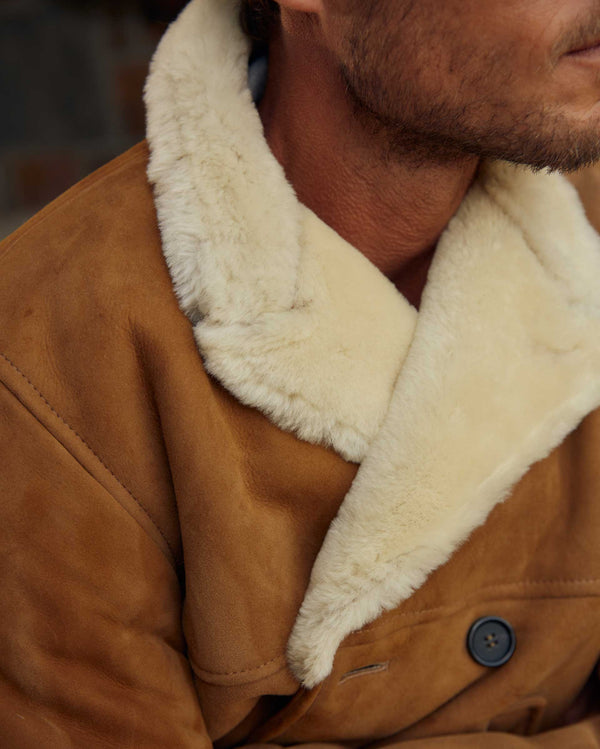 Male model wears the Shearling Bond Peacoat in Honey