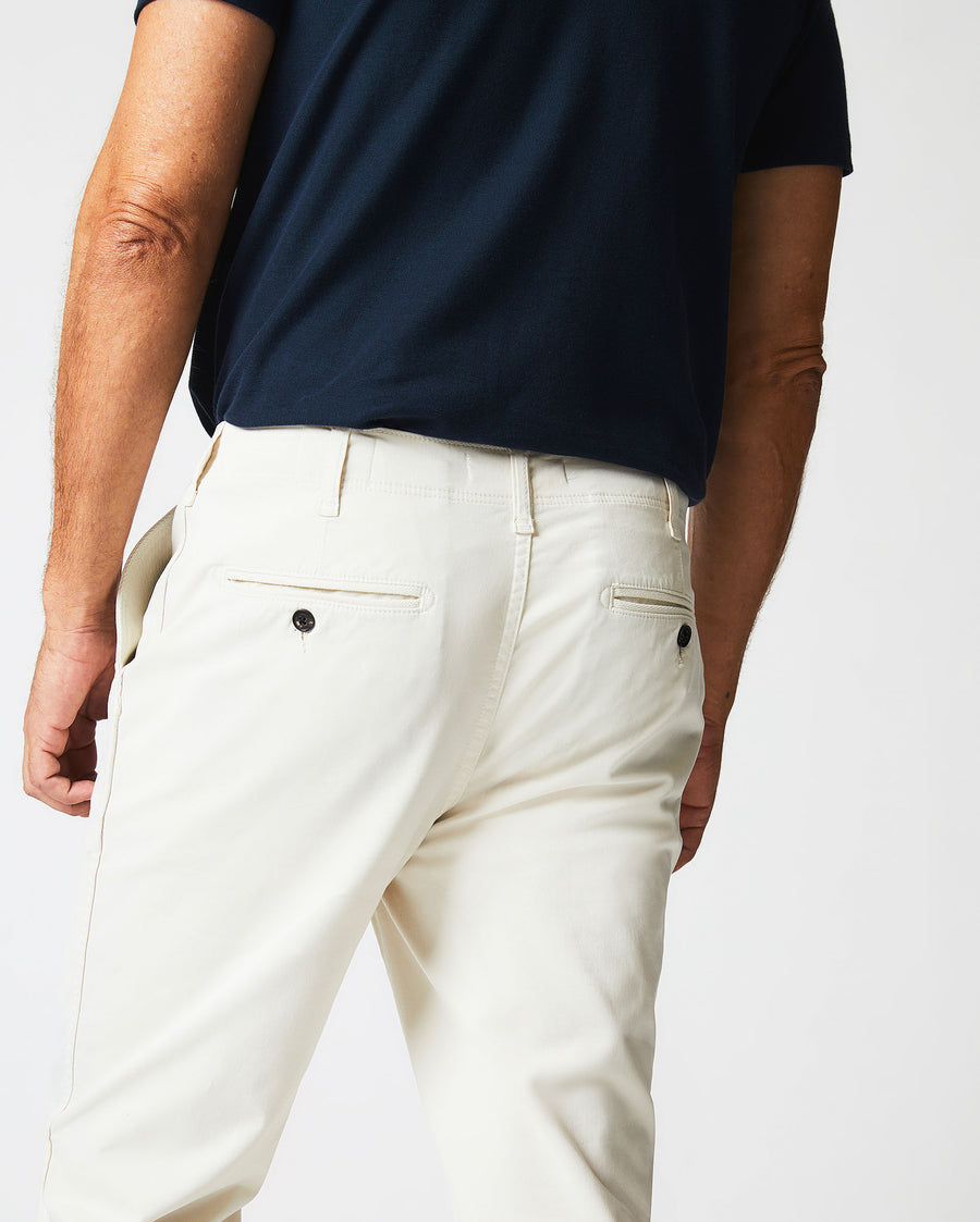 Male model wears the Chino Pant in  Eggshell