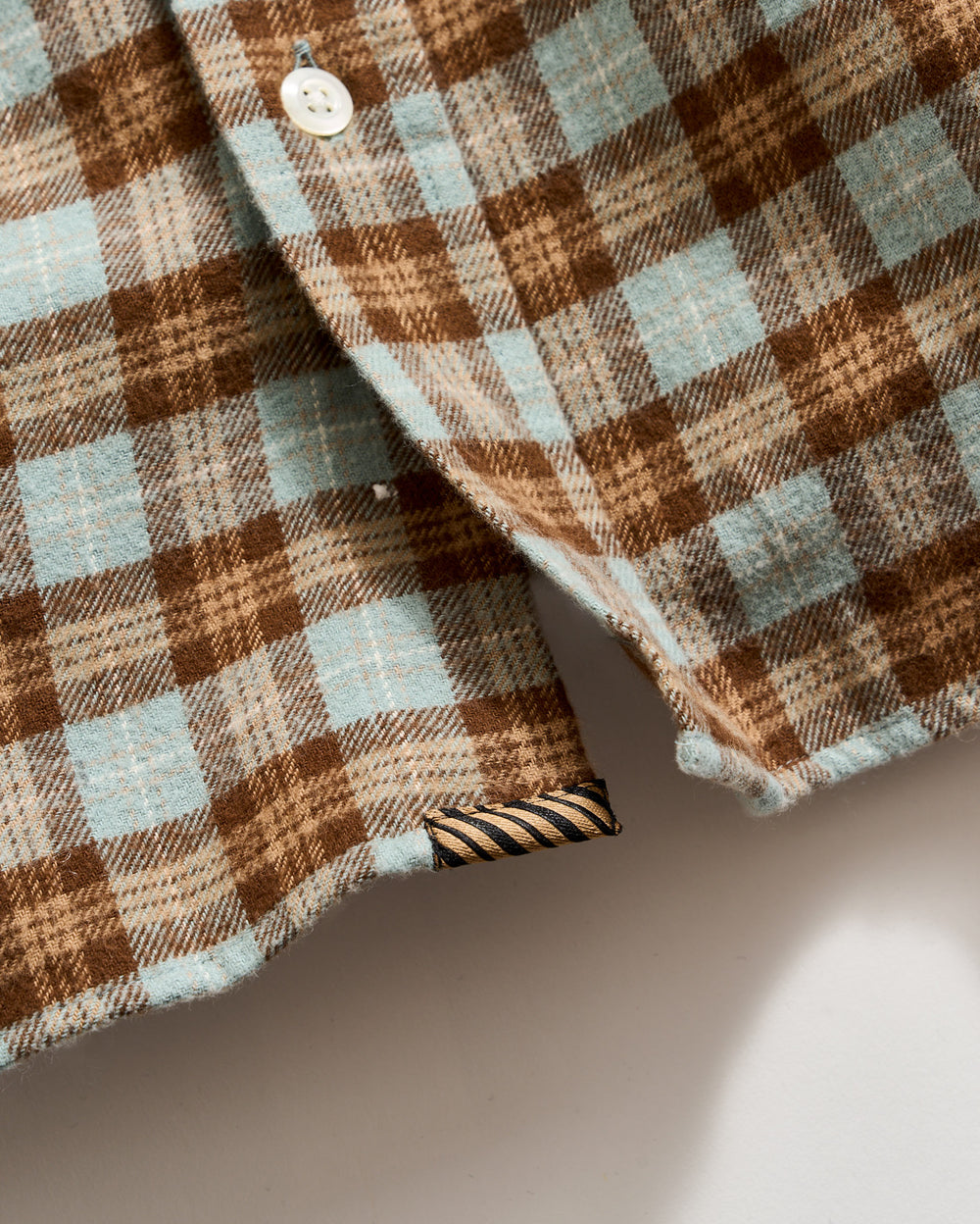 Underplacket with heirloom ribbon stripe tab