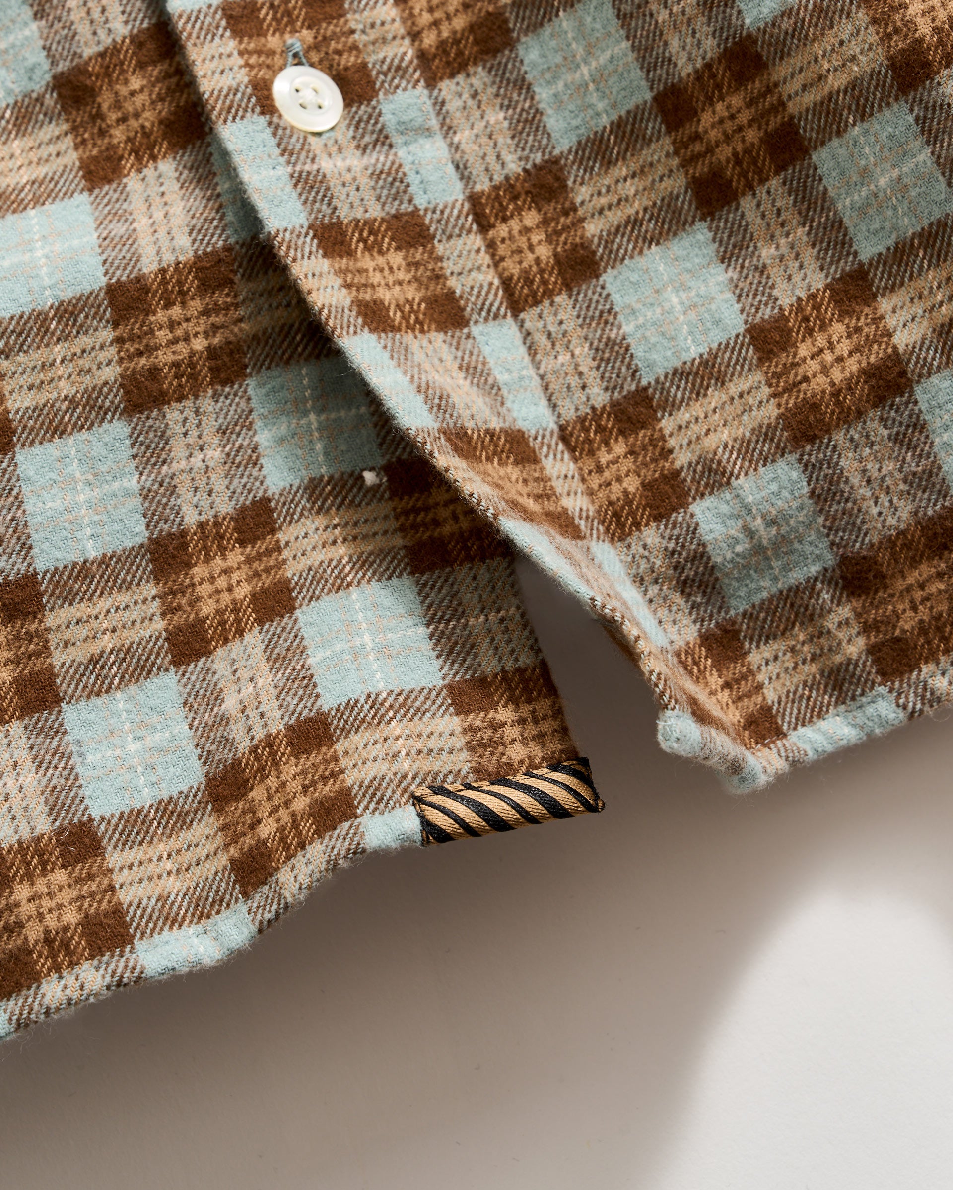Underplacket with heirloom ribbon stripe tab
