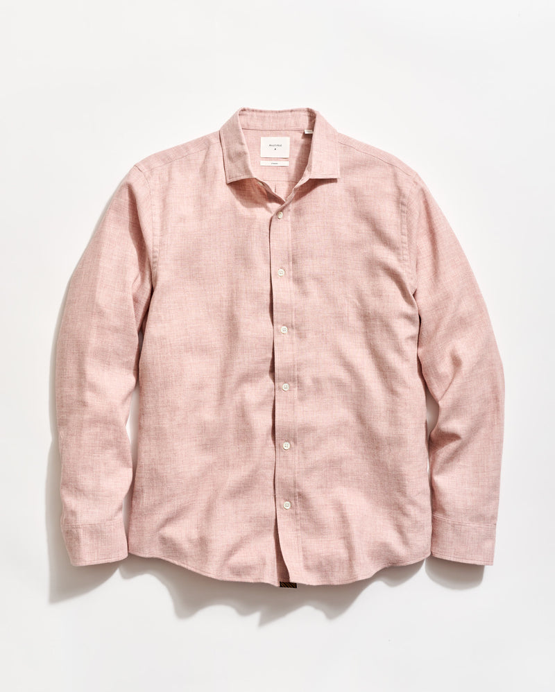 Pink shirt on a light gray background