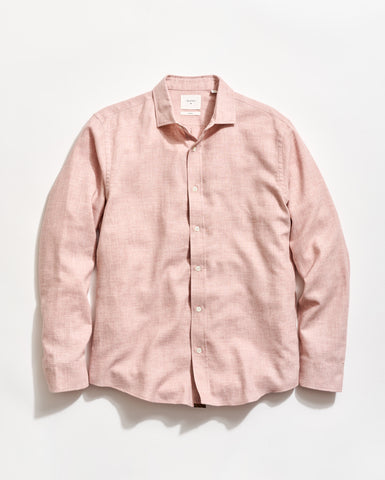 Pink shirt on a light gray background