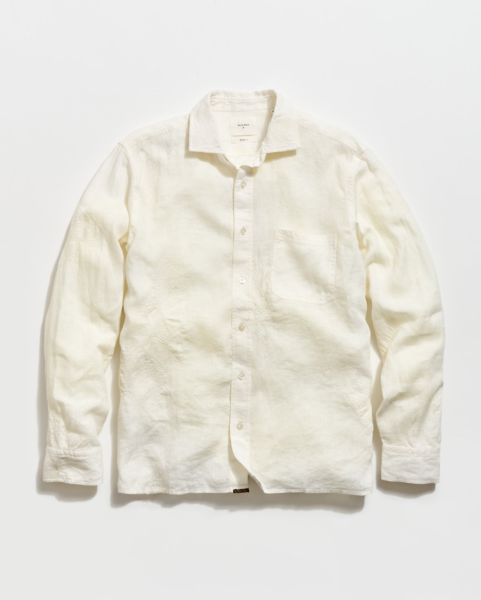 White button-up shirt on a light gray background